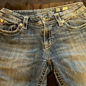 Signature boot style miss me, Jean